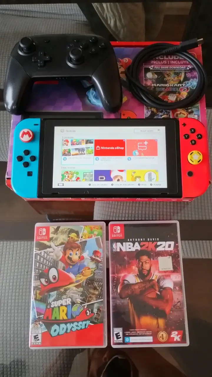 Nintendo Switch+ 2 juegos físicos+ Accesorios - 1