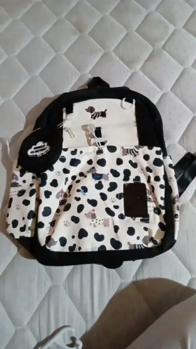 Mochila NUEVA con bolsillos y monedero incluido - miniatura 1