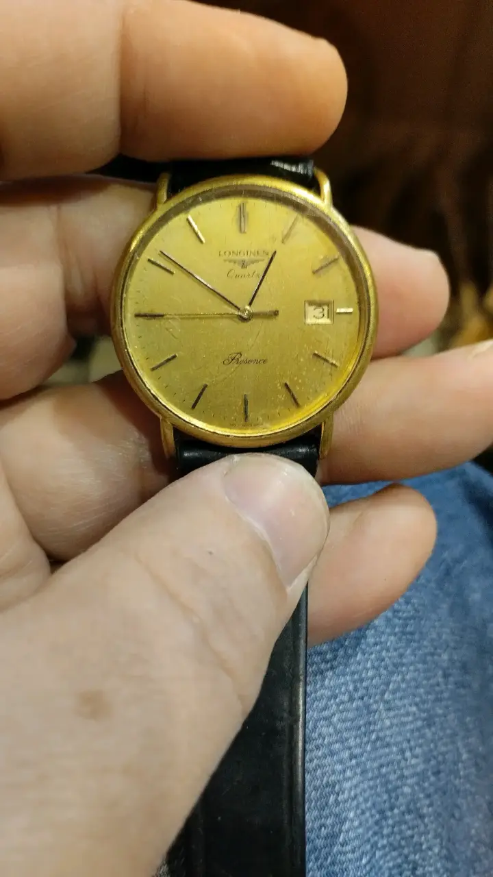 Reloj Longines Quartz dorado clásico