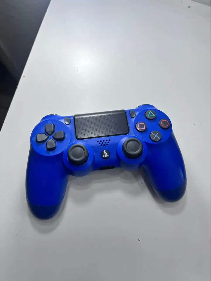 Control inalámbrico azul para PS4 en buen estado - 1