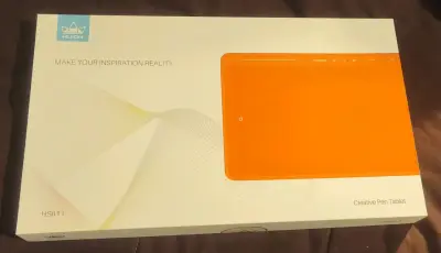 Tableta gráfica Huion HS611 naranja con lápiz - miniatura 1