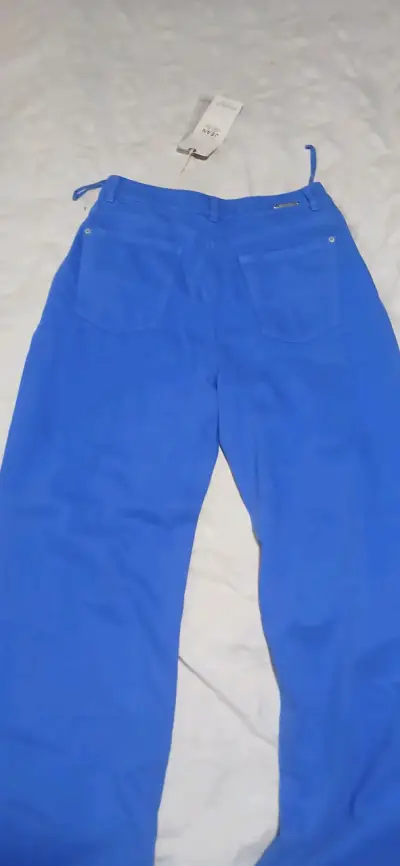 Pantalones azules con diseño desgastado - miniatura 1