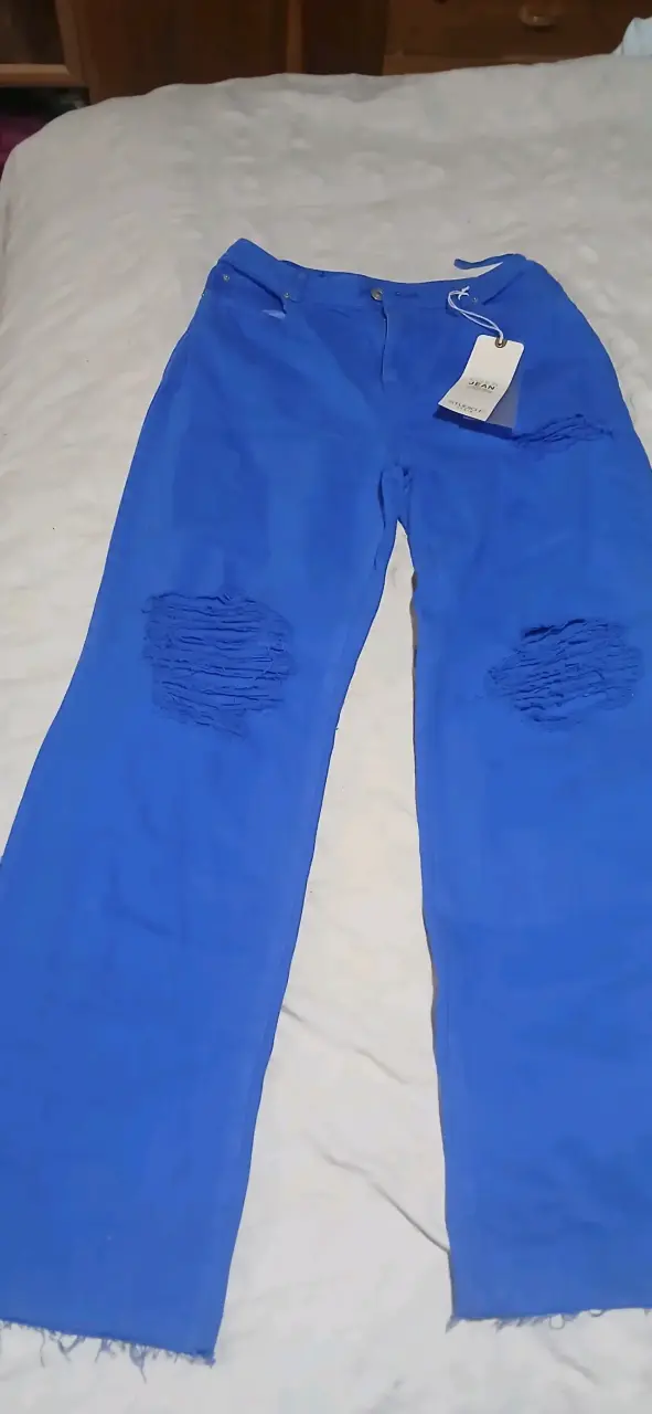 Pantalones azules con diseño desgastado - 2
