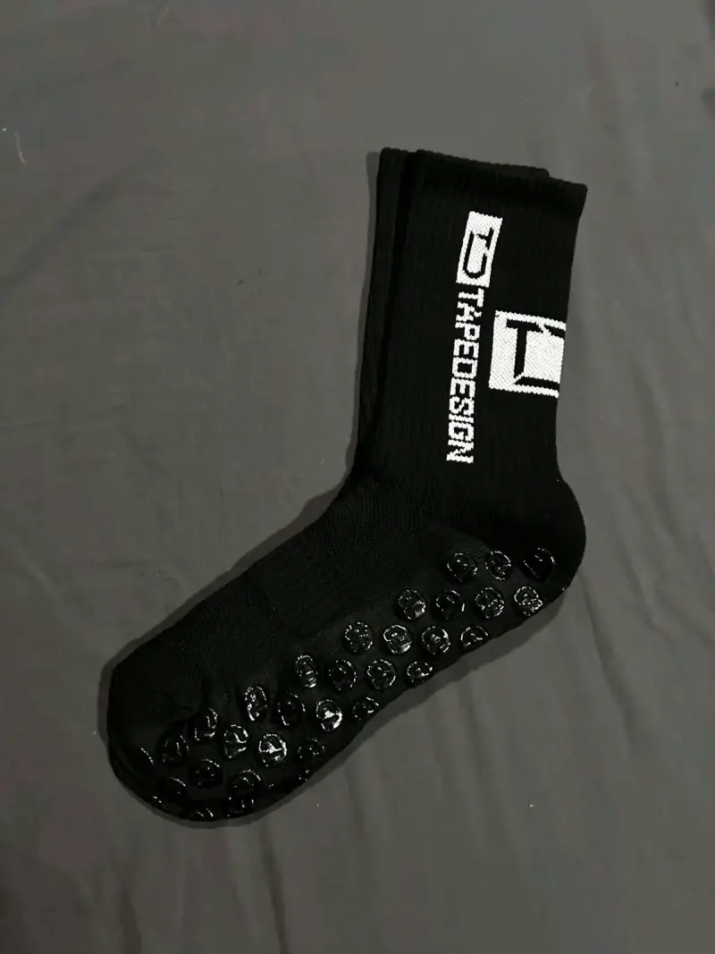 Calcetines antideslizantes negros y blancos de de - 1