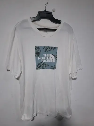 Polera blanca The North Face con diseño frontal - miniatura 2