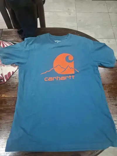 Polera azul Carhartt con logo naranja - miniatura 1