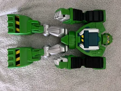 Robot transformable verde para niños - miniatura 1