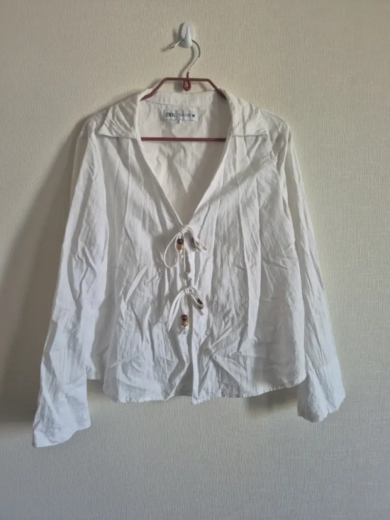 Blusa blanca de lino con lazos Zara - 1