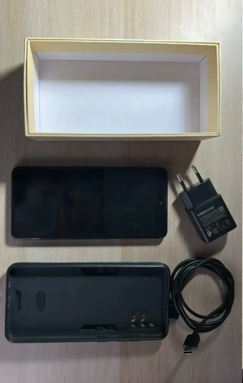 Samsung Galaxy A51 con cargador y funda originales - 1