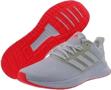 Zapatillas deportivas blancas con suela roja Adidas