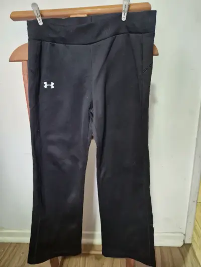 Pantalones deportivos negros Under Armour para mujer - miniatura 1