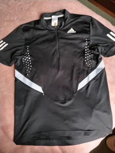 Polera deportiva negra Adidas para hombre - miniatura 1
