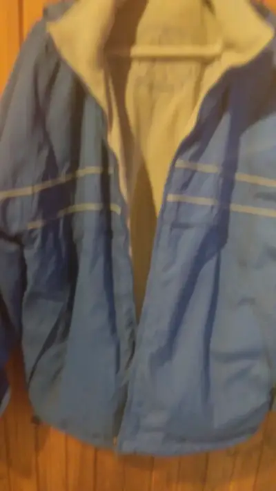 Chaqueta azul con capucha para hombre - miniatura 1
