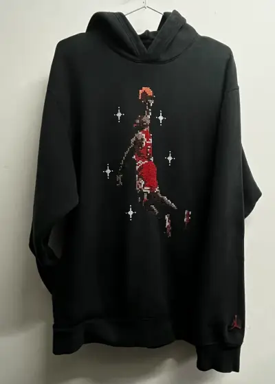 Polerón negro con diseño de baloncesto Jordan - miniatura 1
