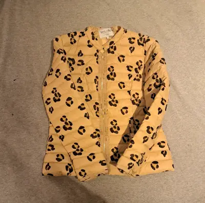Chaqueta acolchada con estampado animal print - miniatura 1