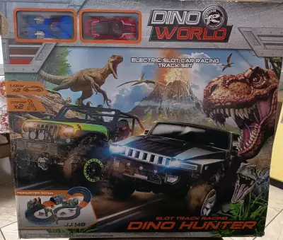 Pista de Autos Eléctrica Dino World con Dinosaurios - miniatura 1