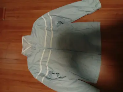 Chaqueta deportiva azul claro Adidas para mujer - miniatura 1