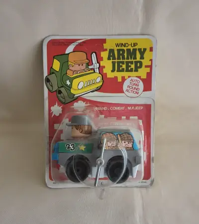 Juguete Jeep Militar Gris  a Cuerda Vintage - miniatura 1