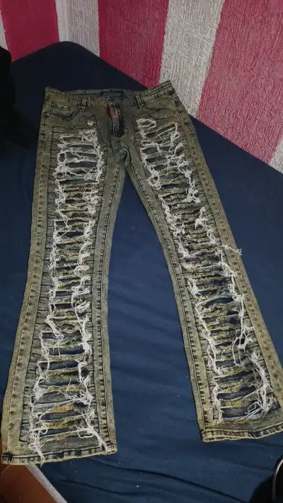 Jeans desgastados estilo rasgado para hombre - miniatura 1