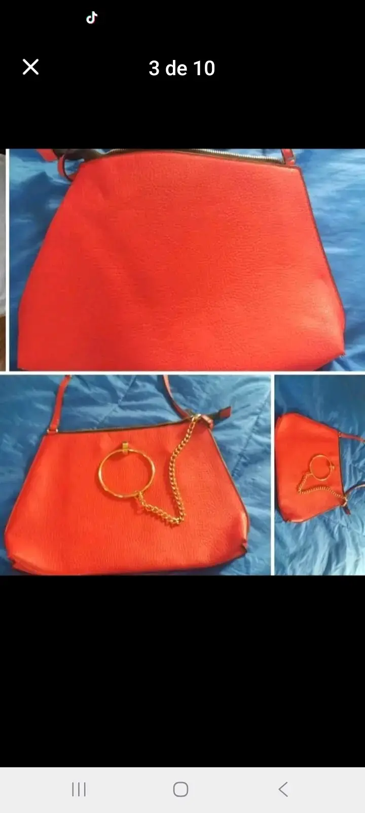 Cartera roja con cadena decorativa