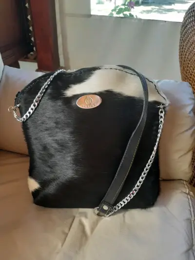 Bolso de cuero natural con diseño animal print - miniatura 1