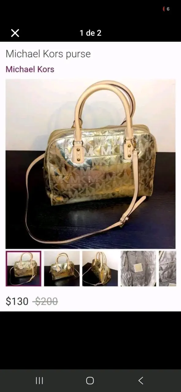 Cartera Michael Kors dorada con logo
