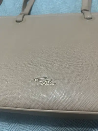 Cartera de cuero beige con correa ajustable - miniatura 2