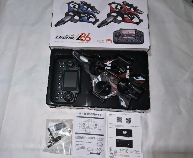 Drone X86 con control remoto y accesorios - 1