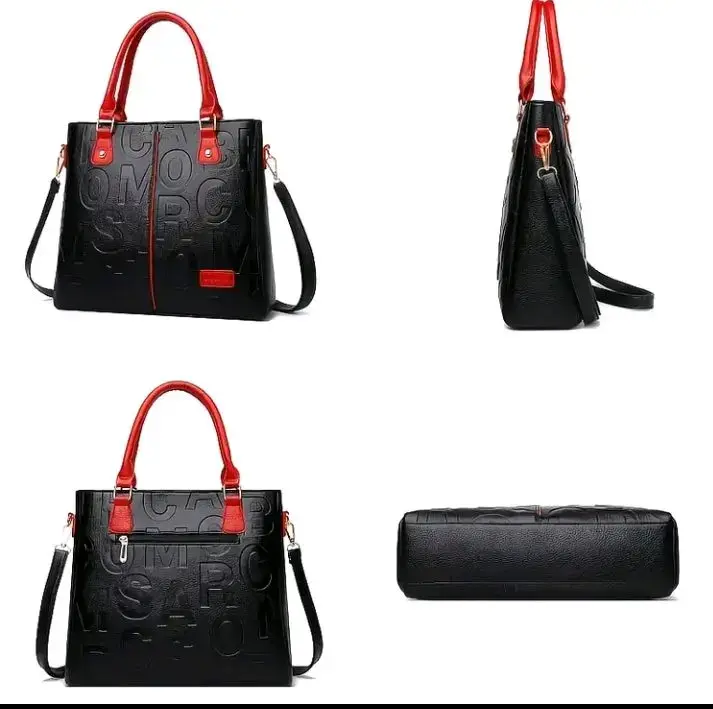 Bolso de mano negro con asas rojas