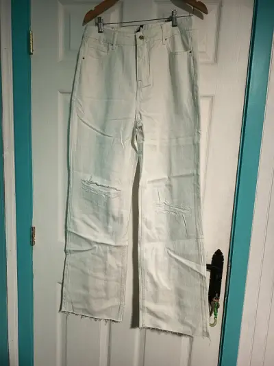 Jeans acampanado azul y recto blanco - miniatura 1
