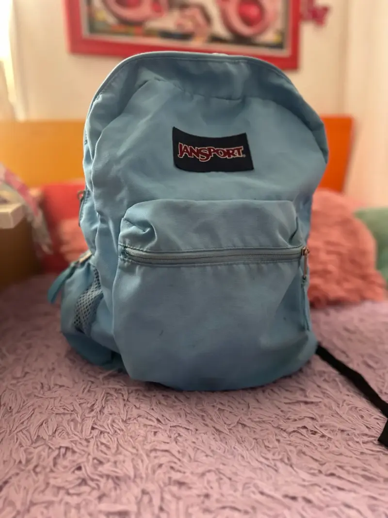 Mochila Jansport azul claro en buen estado - 1