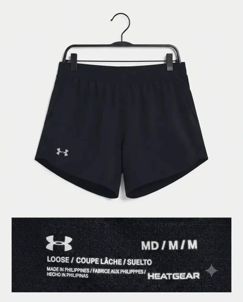 Shorts deportivos sueltos Under Armour negros