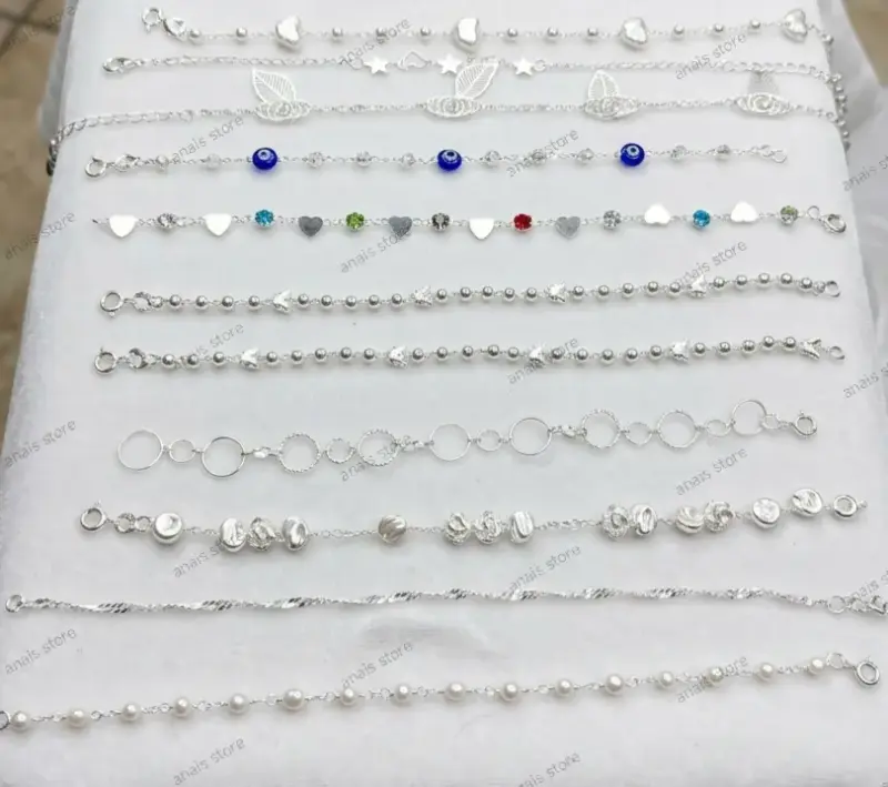Pulseras de plata con dijes y perlas - 3