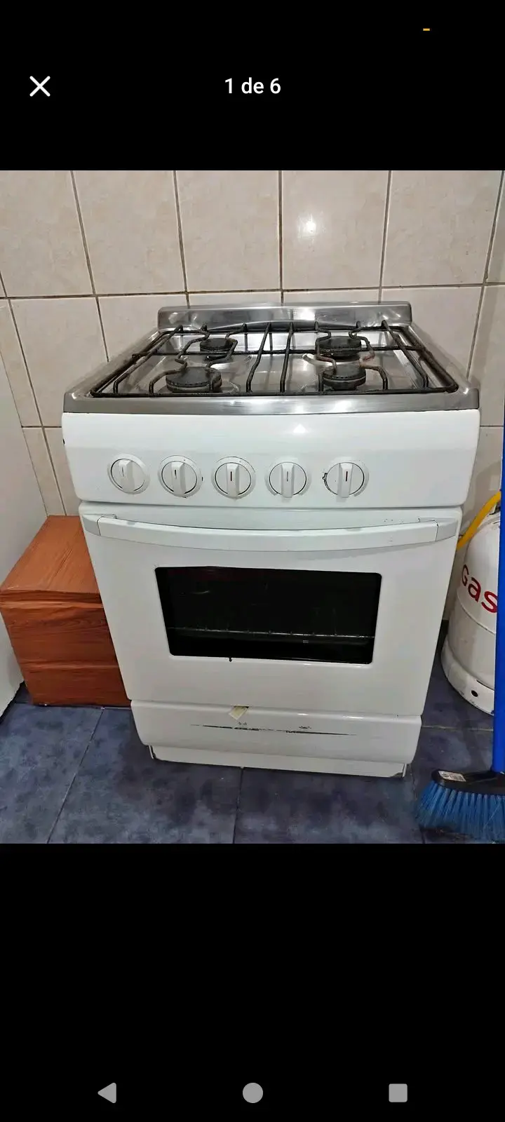 Cocina a gas de 4 quemadores en buen estado