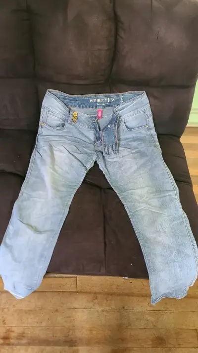 Jeans de mezclilla azul para mujer - miniatura 1