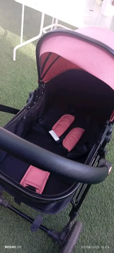 Coche de bebé rosa  ajustable marca bebesit - miniatura 1