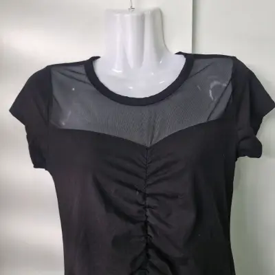 Polera negra con malla transparente para mujer - miniatura 1