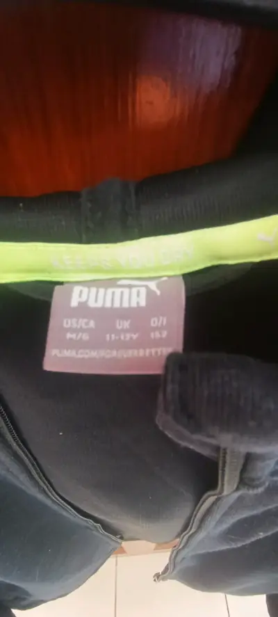 Chaqueta deportiva Puma para niño en negro y amarillo - miniatura 1