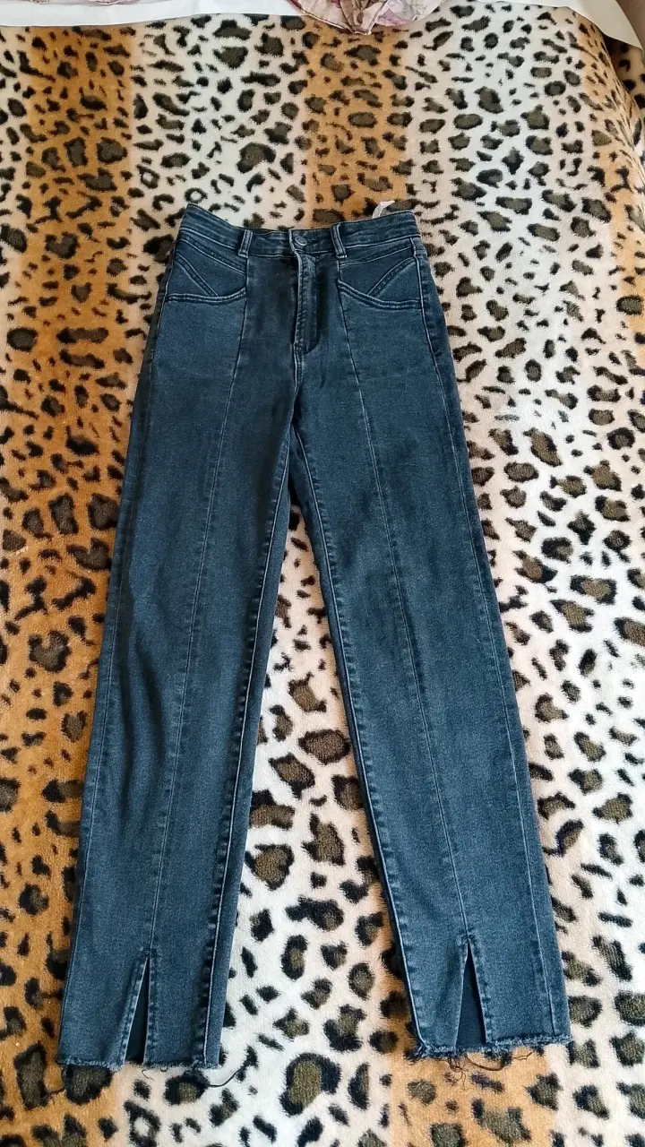 Jeans de mezclilla con aberturas - 1