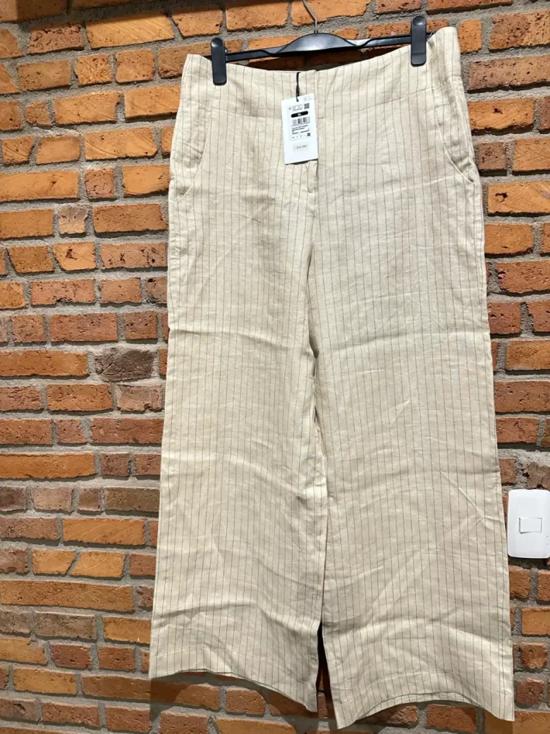Pantalones beige de lino a rayas para mujer - 1