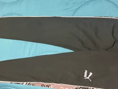 Pantalones deportivos negros Puma para mujer - miniatura 1