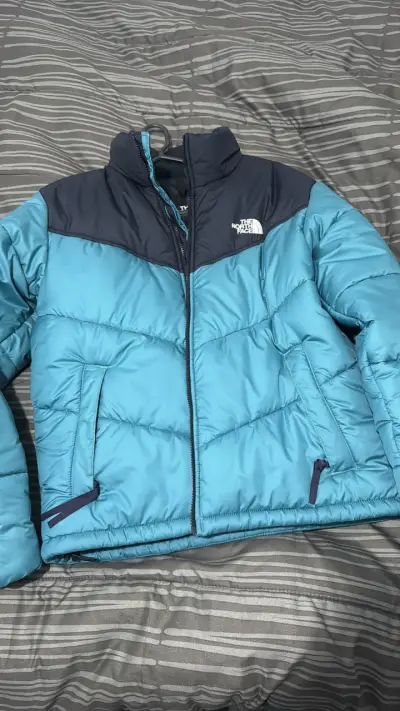 Chaqueta acolchada azul The North Face - miniatura 1