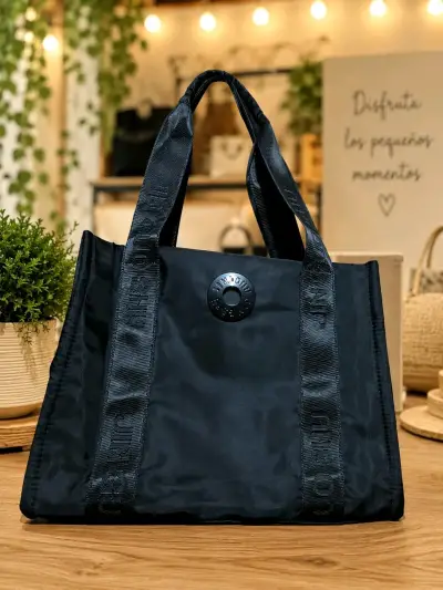 Bolso de mano azul y negro con diseño moderno - miniatura 3