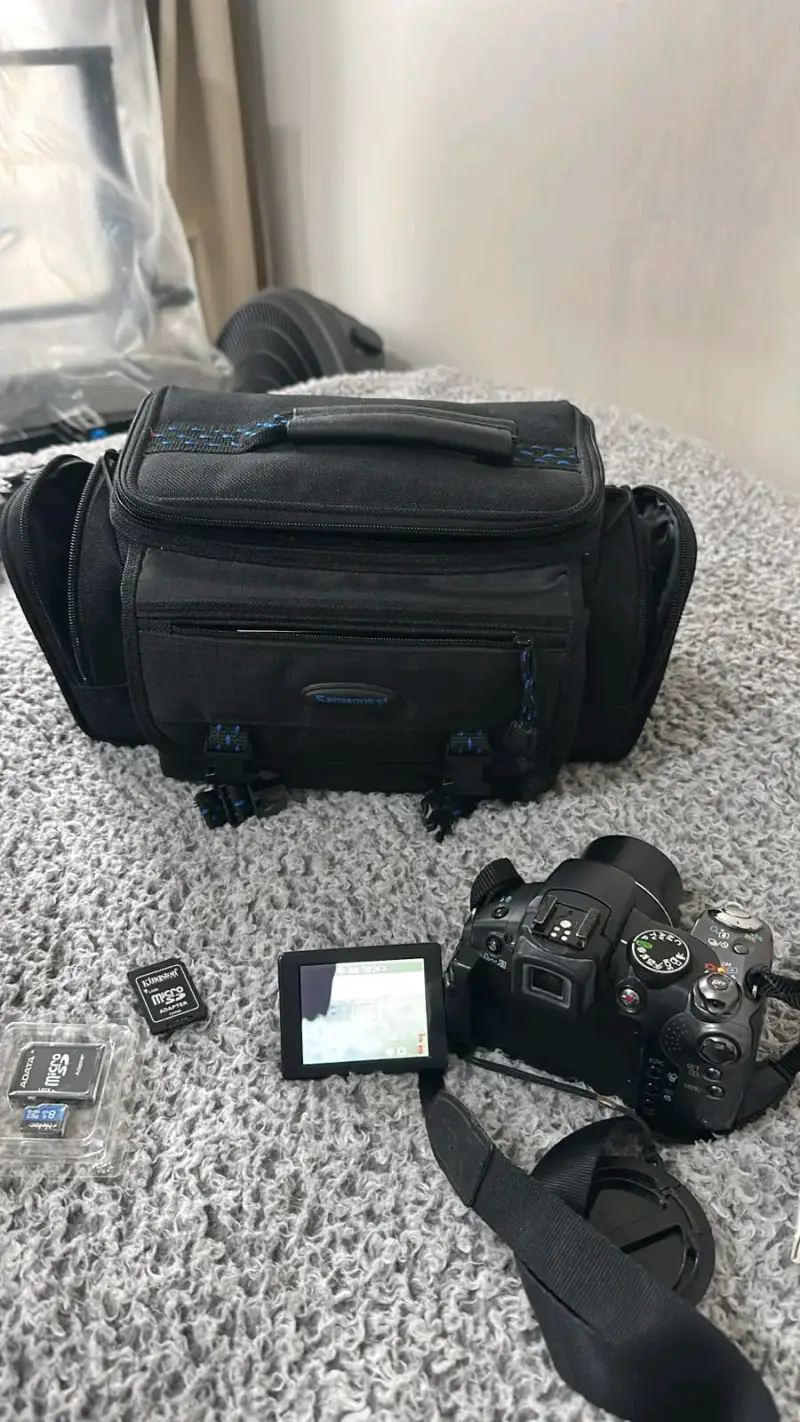 Cámara Canon con bolso Samsonite y accesorios - 3