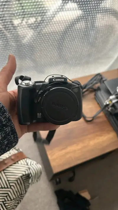 Cámara Canon con bolso Samsonite y accesorios - miniatura 4