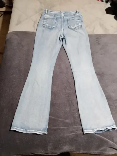 Jeans acampanados celestes para mujer - miniatura 2