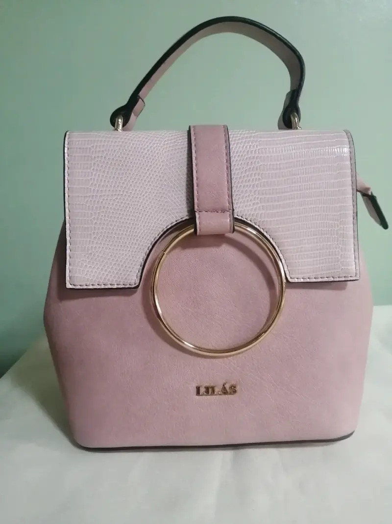 Bolso de mano/mochila rosa con diseño elegante. - 1