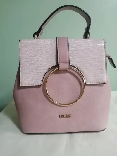Bolso de mano/mochila rosa con diseño elegante. - miniatura 1