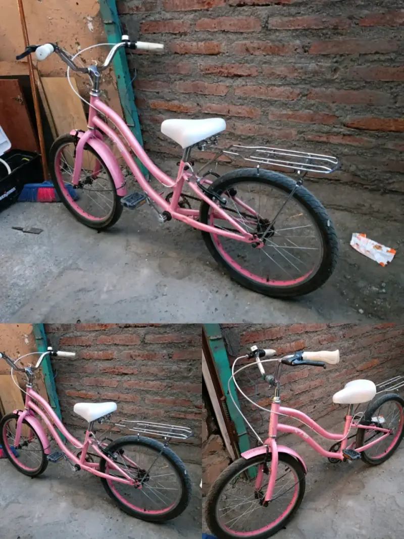 Bicicleta playera rosada con asiento blanco