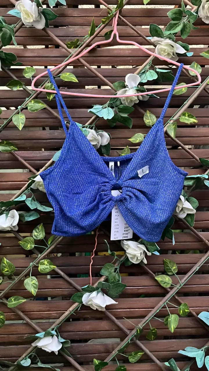 Top azul con diseño de nudo para mujer